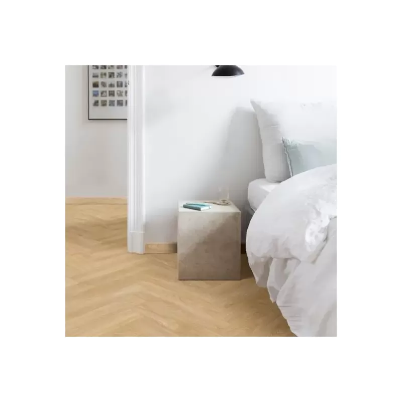 Panele winylowe Moduleo LayRed Herringbone Laurel Oak 51282 - podłoga ułożona w jodełkę w kolorze dębowym