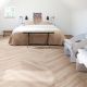 Panele winylowe Moduleo LayRed Herringbone Blackjack Oak 22205 - jasne panele winylowe w sypialni